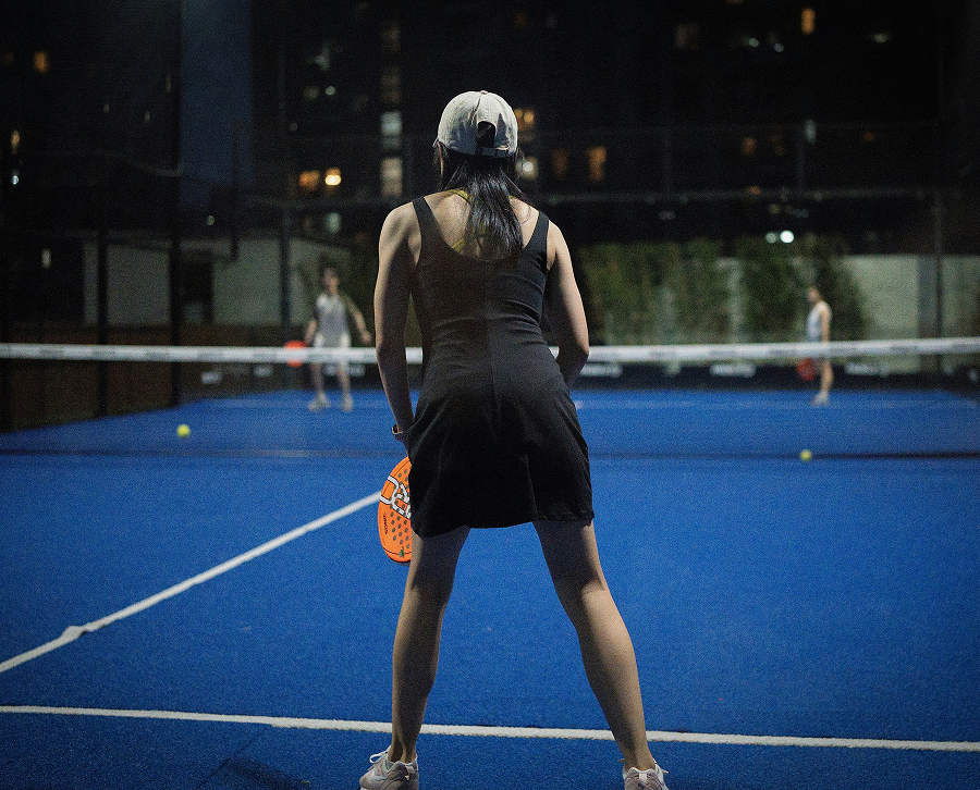 women playing padel